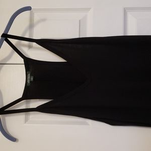 Black jump suit with pockets, size small. Worn once